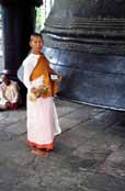 Woman monk near Mingun Bell. Myanmar (Burma).