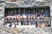 Tau tau figures in front of graves at Lemo. Tana Toraja area. Indonesia.