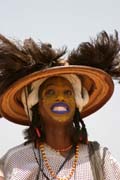 Man from nomadic Wodaab� tribe during performace of Yaake dance at Gerewol festival. Every man shows the teeth and rolls eyes. It makes them more beauty. Niger.