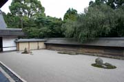 Famous karesansui (dry landscape) rock garden inside Ryoan-ji temple. It has been built in the late 1400s. Kyoto. Japan.