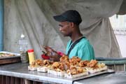 Food seller at carnival, Santiago de Cuba. Cuba.