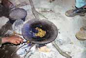 Coffee preparation during coffee ceremony. Local village at Simien mountains. Ethiopia.