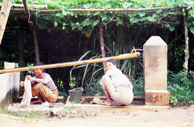 Clothes washing. Myanmar (Burma).
