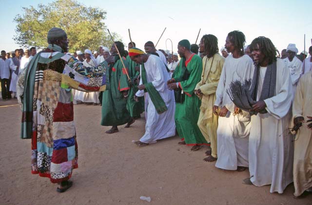 Whirling dervishes are coming. Their color is green. Hamed-an Nil Mosque, Khartoum (Omdurman). Sudan.