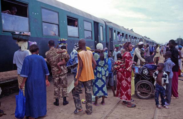 People mummery at one of the few train stops on route Keys-Bamako. Mali.
