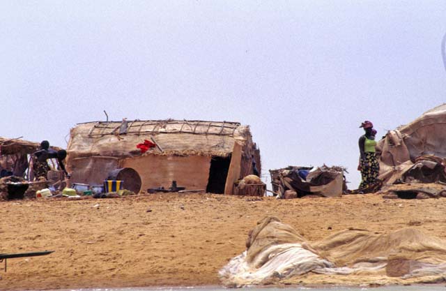Traditional villages on the banks of Niger river. A lot of houses are temporary only and people is nomads according to climatic season. Mali.