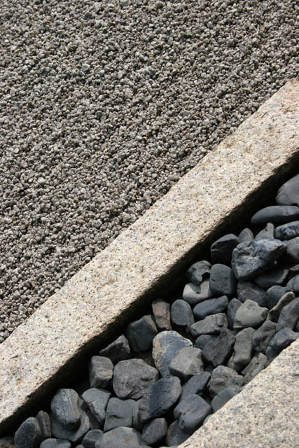 Famous karesansui (dry landscape) rock garden inside Ryoan-ji temple. It has been built in the late 1400s. Kyoto. Japan.
