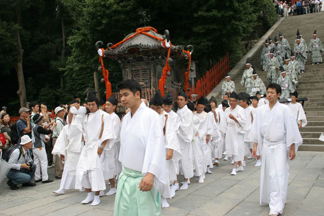 Tsurugaoka Hachiman-gu Shrine Reitaisai (Annual Festival) - three mikoshi (portable shrine) and other things, for example Jinme (sacred horses), Nishiki hata (flags), Hoko (float) and Tachi (sword) are carried in Shinko Sai (parade of Mikoshi). Kamakura. Japan.