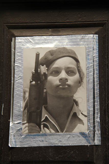 Revolution - photo on the house wall, old Havana (Habana Vieja). Cuba.