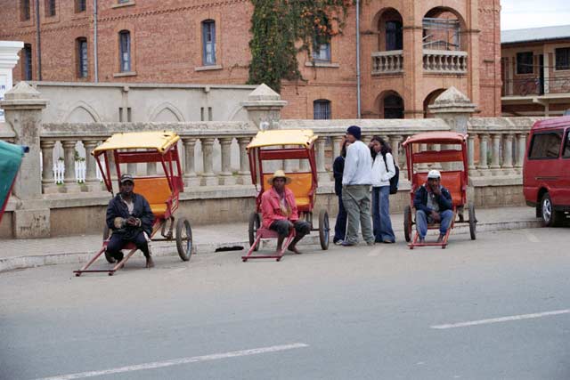 Pousse-pousses are waiting for customers. Antsirabe. Madagascar.